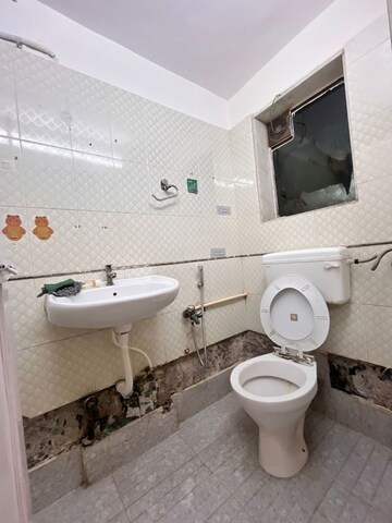 Bathroom in 2 BHK Apartment at Lokhandwala Complex – for Rent