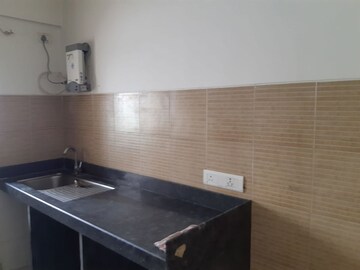 Kitchen in 1 BHK Apartment at Metropolis Bayside, Kasarvadavali – for Rent