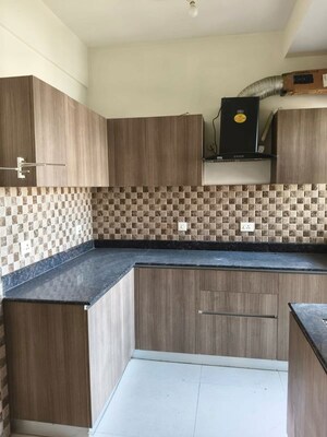 Kitchen in 3 BHK Apartment at Adani Oyster Grande Phase 2, Sector 102 – for Rent
