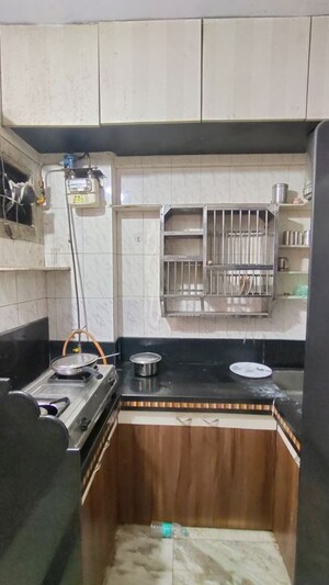 Kitchen in 1 BHK Apartment at Anurag CHS Louis Wadi, Louis Wadi – for Sale