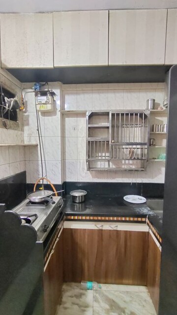 Kitchen in 1 BHK Apartment at Anurag CHS Louis Wadi, Louis Wadi – for Sale