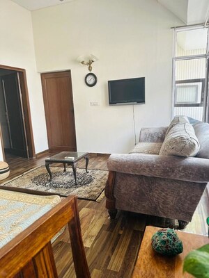 Living Room in Studio Apartment at Greater Kailash I – for Rent