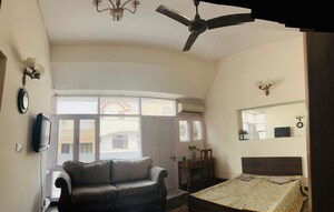 Living Room in Studio Apartment at Greater Kailash I – for Rent