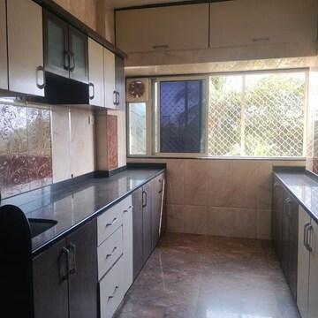 Kitchen in 1 BHK Apartment at Sea Shell Apartment, Andheri West – for Rent