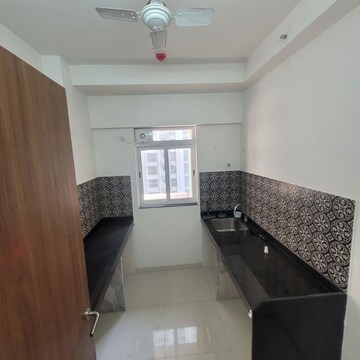 Kitchen in 1 BHK Apartment at Lodha Amara, Kolshet Road – for Sale