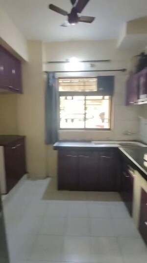 Kitchen in 2 BHK Apartment at Vijay Apartments Waghbil, Waghbil – for Rent