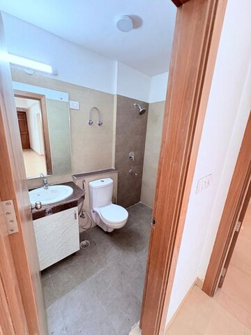 Bathroom in 3.5 BHK Apartment at ATS Homekraft Pious Hideaways, Sector 150 – for Rent