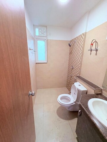 Bathroom in 3.5 BHK Apartment at ATS Homekraft Pious Hideaways, Sector 150 – for Rent