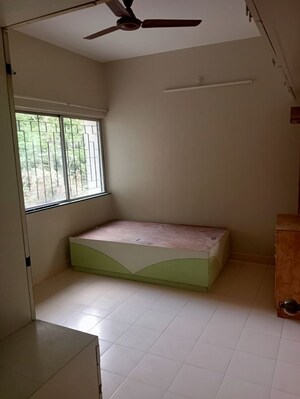 Bedroom in 2 BHK Apartment at Kumar Padmalaya, Aundh – for Sale