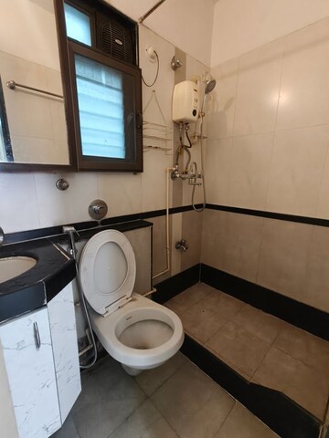 Bathroom in 2 BHK Apartment at Greenwoods CHS, Andheri East – for Rent