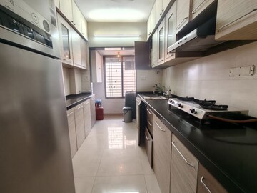 Kitchen in 2 BHK Apartment at Greenwoods CHS, Andheri East – for Rent