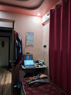 Bedroom in 2 BHK Apartment at Dombivli West – for Sale