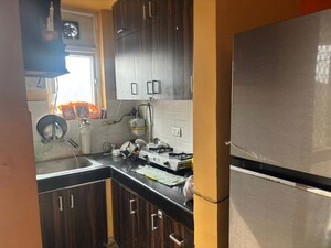 Kitchen in 1 BHK Apartment at Aditya Celebrity Homes, Sector 76 – for Rent