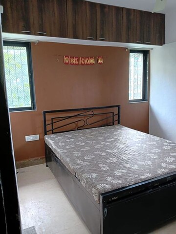 Bedroom in 3 BHK Apartment at Savita Nagar CHS, Louis Wadi – for Sale