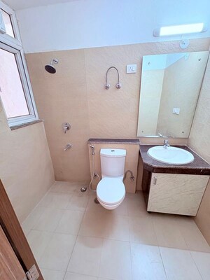 Bathroom in 3.5 BHK Apartment at ATS Homekraft Pious Hideaways, Sector 150 – for Rent