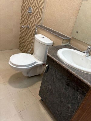 Bathroom in 3.5 BHK Apartment at ATS Homekraft Pious Hideaways, Sector 150 – for Rent