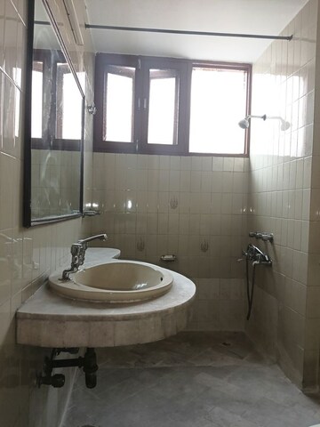 Bathroom in 3 BHK Builder Floor at Panchsheel Enclave – for Rent
