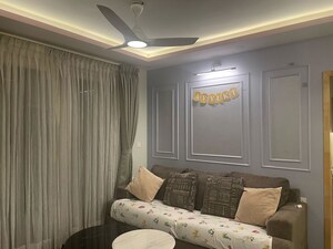Living Room in 2 BHK Apartment at Bhartiya Nikoo Homes Phase 2, Thanisandra Main Road – for Rent