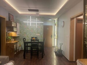 Living Room in 2 BHK Apartment at Bhartiya Nikoo Homes Phase 2, Thanisandra Main Road – for Rent
