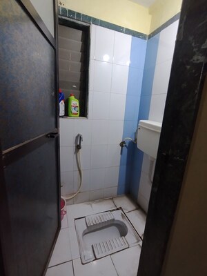Bathroom in 1 BHK Apartment at Garden Court, Waghbil – for Sale