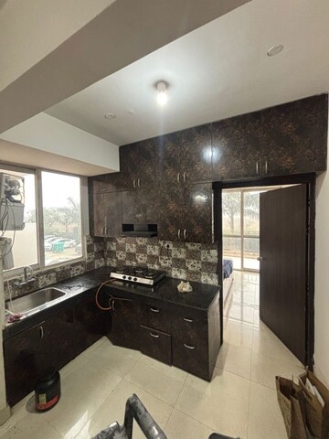 Kitchen in 3 BHK Apartment at Pioneer Park Presidia, Sector 62 – for Sale