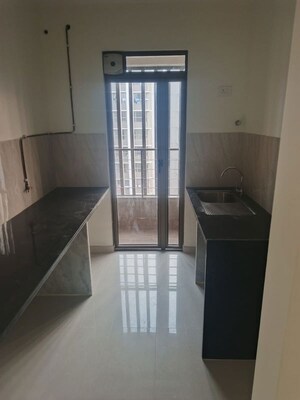 Staircase in 2 BHK Apartment at Kalpataru Paramount E, Kapur Bawdi – for Rent