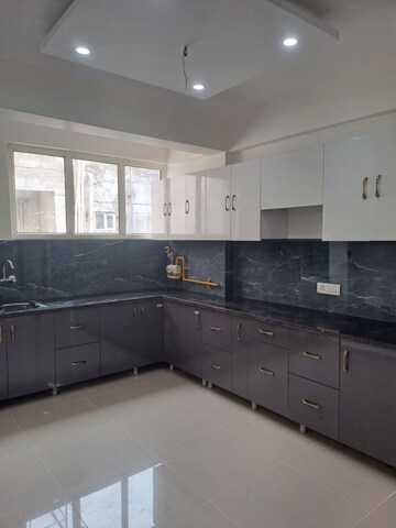 Kitchen in 2 BHK Apartment at BCC Bharat City Phase I, Indraprastha Yojna – for Sale