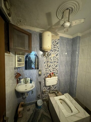 Bathroom in 2 BHK Builder Floor at Khirki Extension – for Rent