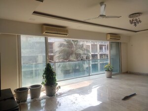 Living Room in 4 BHK Apartment at White Lotus, Santacruz West – for Rent