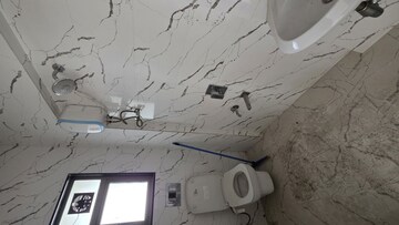 Bathroom in 2 BHK Apartment at Joshi Amar Vaishali CHS, Naupada – for Sale