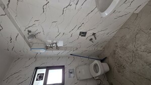 Bathroom in 2 BHK Apartment at Joshi Amar Vaishali CHS, Naupada – for Sale