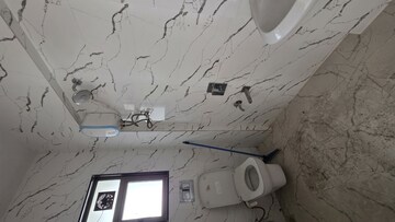 Bathroom in 2 BHK Apartment at Joshi Amar Vaishali CHS, Naupada – for Sale