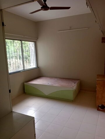 Bedroom in 2 BHK Apartment at Nisarg Varsha, Aundh – for Rent