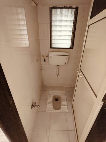 Bathroom in 1 BHK Apartment at Shri Kambeshwar Heights, Morya Nagar – for Rent