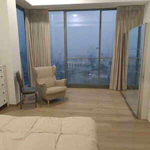 Living Room in 4 BHK Apartment at Rustomjee Crown, Gokhale Road – for Sale