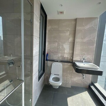 Bathroom in 4 BHK Apartment at Rustomjee Crown, Gokhale Road – for Sale