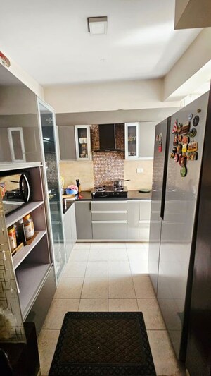 Kitchen in 3 BHK Apartment at Gaur Sportswood, Sector 79 – for Rent