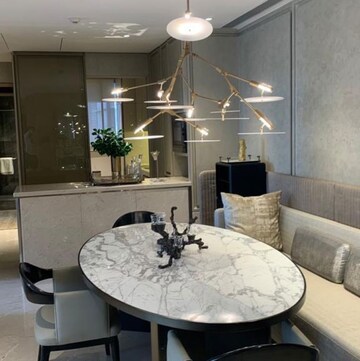 Living Room in 4 BHK Apartment at Rustomjee Crown, Gokhale Road – for Sale