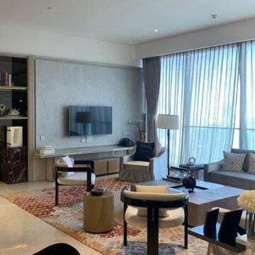 Living Room in 4 BHK Apartment at Rustomjee Crown, Gokhale Road – for Sale