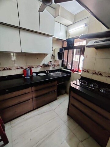 Kitchen in 2 BHK Apartment at SKD Pinnacolo, Mira Road – for Sale