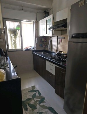 Kitchen in 2 BHK Apartment at Romell Diva, Malad West – for Sale