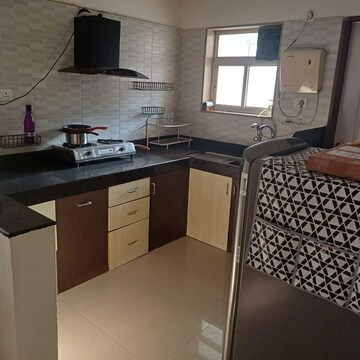 Kitchen in 2 BHK Apartment at Venkatesh Flora Phase II, Mundhwa – for Rent
