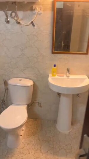 Bathroom in 2 BHK Apartment at Amrapali Heartbeat City, Sector 107 – for Rent