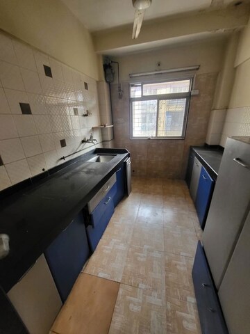 Kitchen in 1 BHK Apartment at Agarwal Peace Heaven, Vasai West – for Sale