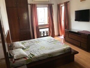 Bedroom in 3 BHK Apartment at RWA Jalvayu Vihar, Sector 25 – for Rent