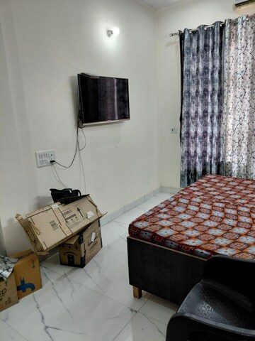 Bedroom in 3 BHK Builder Floor at Patel Nagar Society, Sector 15 – for Rent