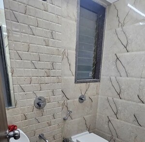 Bathroom in 1 BHK Apartment at Abrol Avirahi Heights, Malad West – for Rent