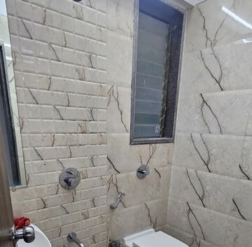 Bathroom in 1 BHK Apartment at Abrol Avirahi Heights, Malad West – for Rent