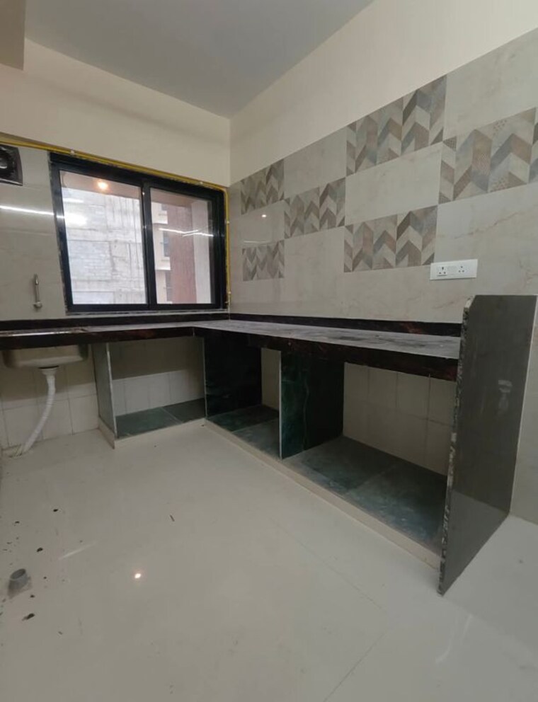 Kitchen, ami-zarna 1 Bedroom 650 Sq.Ft. Apartment In Malad West Mumbai 9857183