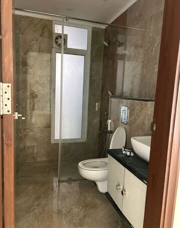 Bathroom in 4 BHK Apartment at Mahagun Mezzaria, Sector 78 – for Rent